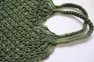 Yeniden kullanılabilir dize alışveriş eko örgü çanta Wgite backgrou izole