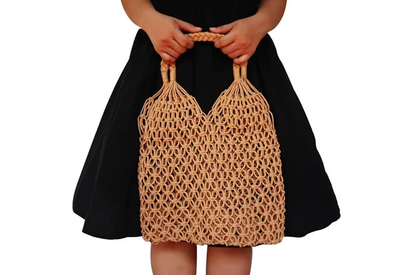 Young woman holding Reusable string shopping eco mesh bag Isolat Stock Photo