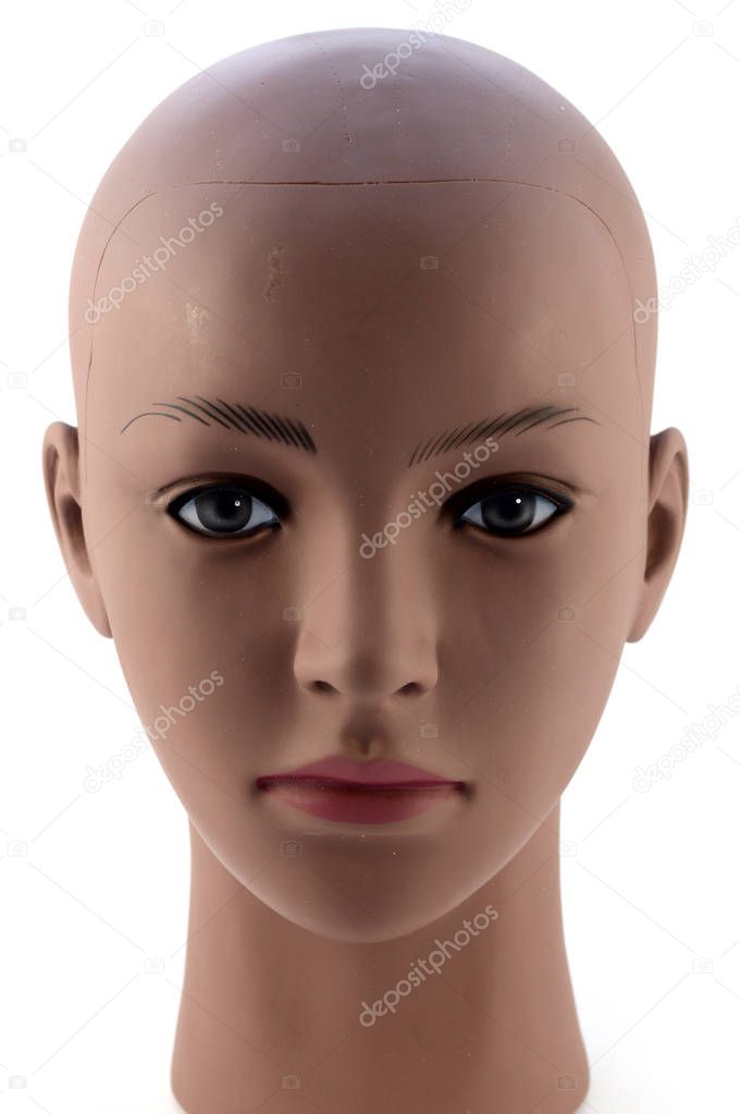 Closeup image of a dark skin toned manniquins head for displaying your products of retail.
