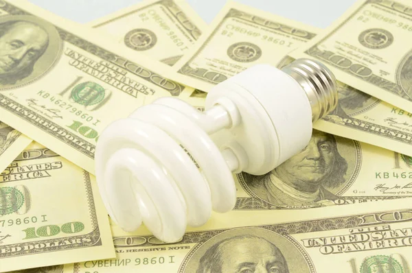 Concept Based Saving Money Using Economical Lightbulbs — Stock Photo, Image