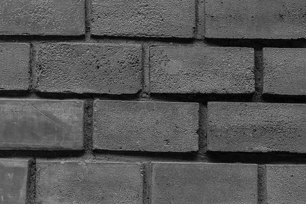 暗い灰色の石が折り畳まれた長方形ブロック暗い基本都市モノクロの水平方向の行をキャンバスします — ストック写真