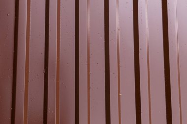 demir sac profil dikey paralel çizgiler kahverengi parlak temel Endüstriyel arka plan oluklu