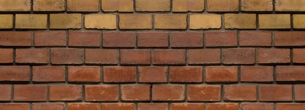 Panneau étroit pierre mur fond base brun clair jaune rangée sans fin bloc base grunge — Photo