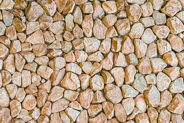 Hell beige Granit Stein Hintergrund hart unebene Oberfläche Basis städtisches Design monochrom Basis Mini-Steine — Stockfoto