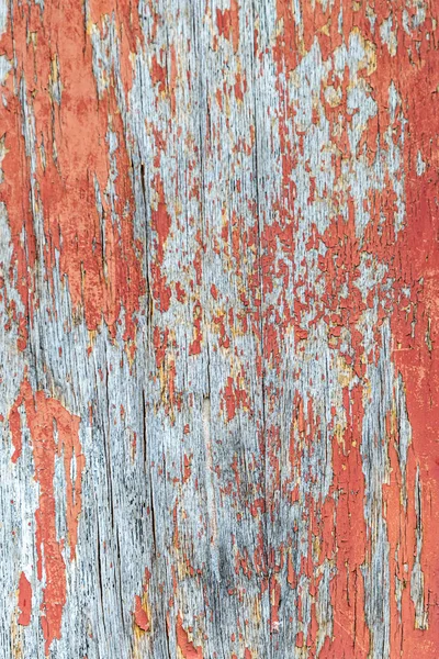 Superficie verticale in legno incrinato incrinato rosso vernice base grunge design sfondo — Foto Stock