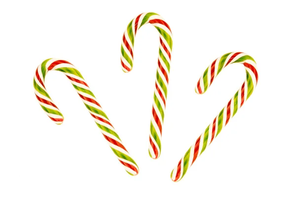 Drie suiker Candy Cane groen rood op een witte achtergrond Bright Candy design feestelijke — Stockfoto