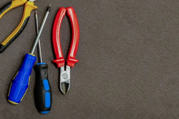 Set herramienta borde borde copia espacio construcción diseño fondo alambre cortadores rojo azul destornillador —  Fotos de Stock