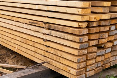 uzun bej kurulları yığını yüksek kurutulmuş yapı malzemeleri eko arka plan yatay desen