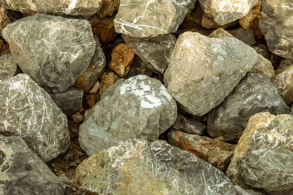 Closeup gray stone cobble gray uneven gravel weathered cobblestone background — Stock Photo, Image