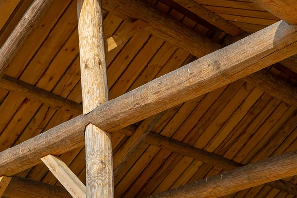 wooden roof crosshair wooden light beige close-up construction of country