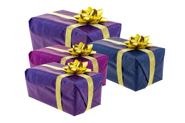 Giftbox lilac blue holiday gift golden ribbon bow surprise. Four boxes on white background Stock Image