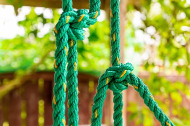ip kalın yeşil örgülü plastik düğüm otostop arka plan dikey ip
