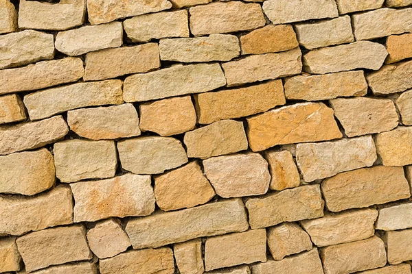 Cobble Stone beige bruin oude ongelijke stenen City Square traditionele close-up — Stockfoto