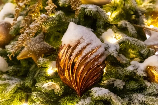 Christmas Toy Gold Twisted Sprinkled Snow Festive Decor — Stock Photo, Image