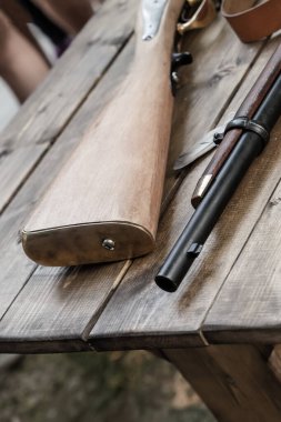 musket butt and barrel part of a firearm close-up background military