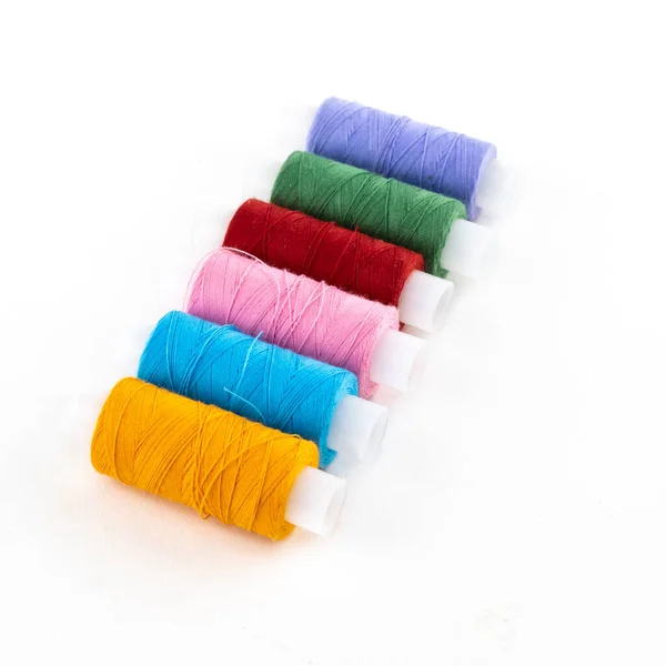 Row Colored Cotton Threads Orange Blue Lilac White Isolated Background — Stock Photo, Image