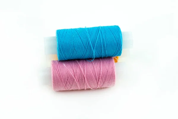 Pair Bright Blue Pink Threads White Background — Stock Photo, Image