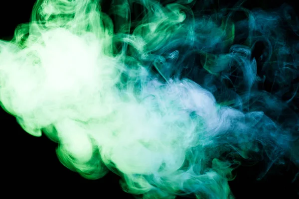 色鮮やかな黄色し 緑の孤立した黒地に煙 アーク プラズマ蒸着法の煙から背景 — ストック写真