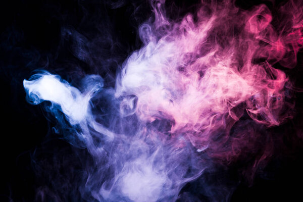 Pink and purple  smoke on black backgroun