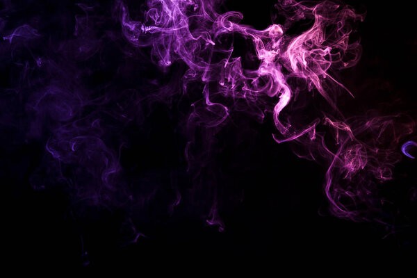 Cloud of blue and pink smoke on a black isolated background. Background from the smoke of vap