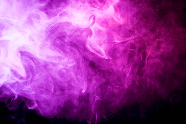 Thick pink smoke on a black isolated background. Background from the smoke of vap