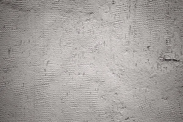 用石膏覆盖的灰色旧墙的特写 灰色背景 — 图库照片