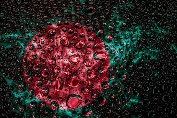 Bir damla su Bangladeş Ulusal bayrak izole bir arka plan üzerinde çerçevede bir close-up