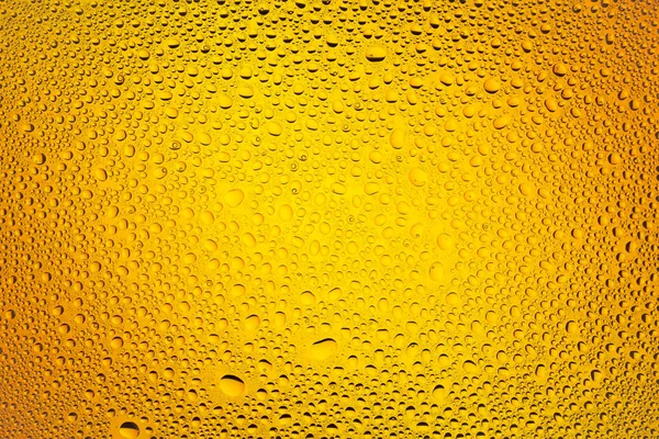 İn yakın bir su damlaları ile kaplı bir turuncu degrade arka plan üzerinde damla su - yoğunlaşma.