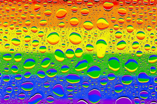 Close Van Een Water Druppels Een Veelkleurige Regenboog Achtergrond Met — Stockfoto