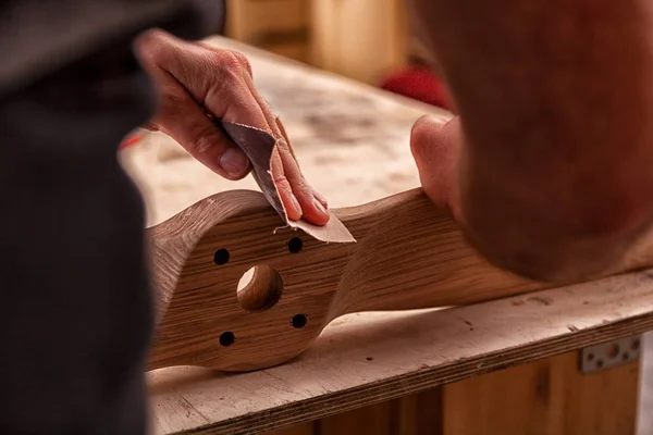 Working Man Cap Shirt Polishes Wooden Block Sandpaper Painting Workshop — Stock Photo, Image