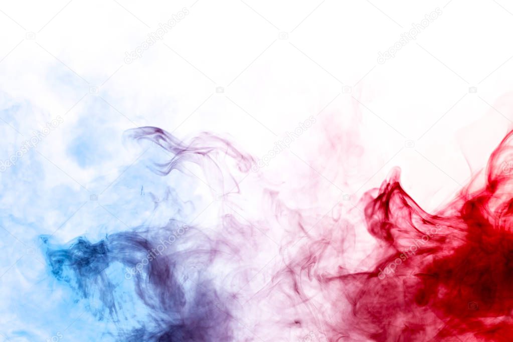 Cloud of red and blue smoke on a black isolated background. Background from the smoke of vap