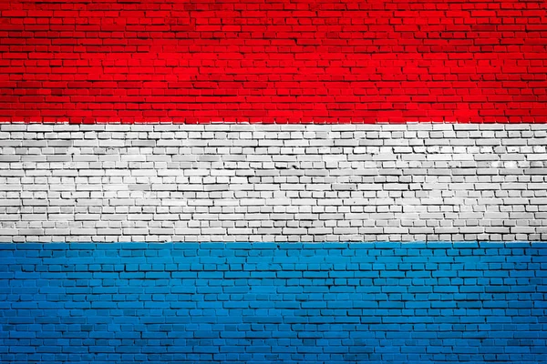 Bandeira Nacional Luxemburgo Sobre Fundo Tijolo — Fotografia de Stock