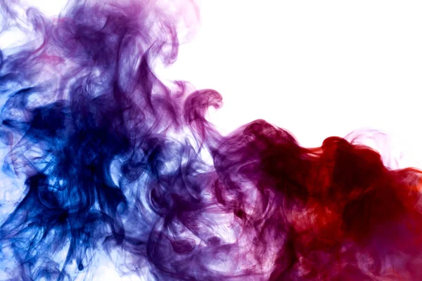 Cloud of pink, red and blue smoke on a white isolated background. Background from the smoke of vap
