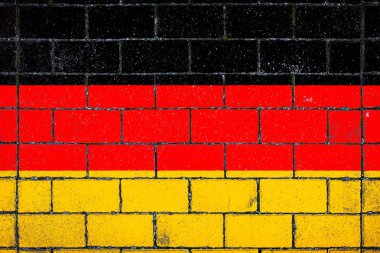 Taş bir arka plan bir arka plan karşı Almanya'nın ulusal bayrak yosun kaplı