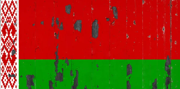 National flag of Belarus on the background of an old mettale covered with peeling paint