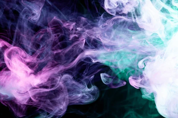 Fumo Spesso Colorato Verde Rosa Blu Uno Sfondo Nero Isolato — Foto Stock