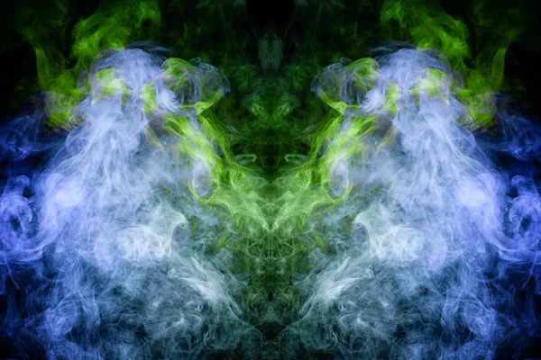 Fantasy print for clothes: t-shirts, sweatshirts. Blue and green cloud of smoke in the form of a monster  of  black isolated background. Background from the smoke of vape