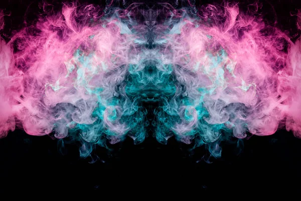 Mocap for cool t-shirts. Dense multicolored smoke of   blue, purple and pink colors in the form of a skull, monster, dragon  on a black isolated background.