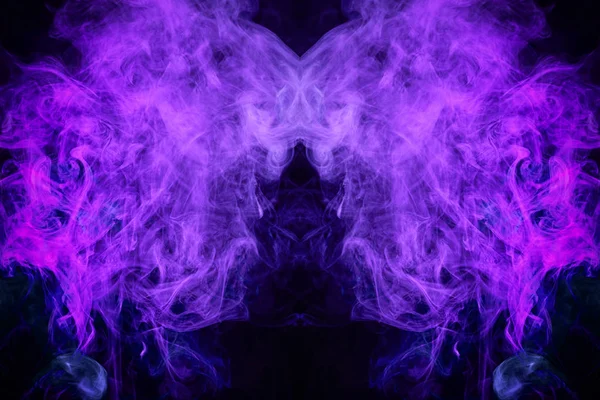 Fantasy print for clothes: t-shirts, sweatshirts. Thick colorful smoke of purple, blue colors smoke in the form of a skull, monster, dragon on a black isolated background. Background from the smoke of vap