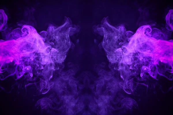 Fantasy print for clothes: t-shirts, sweatshirts. Thick colorful smoke of purple, blue colors smoke in the form of a skull, monster, dragon on a black isolated background. Background from the smoke of vap