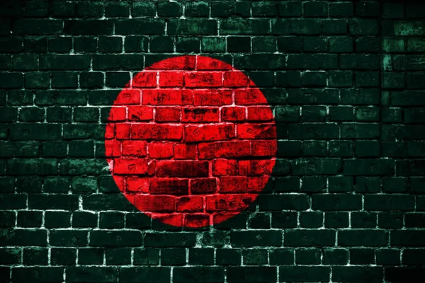 National flag of Bangladesh on a brick background. Concept image for Bangladesh: language , people and culture.