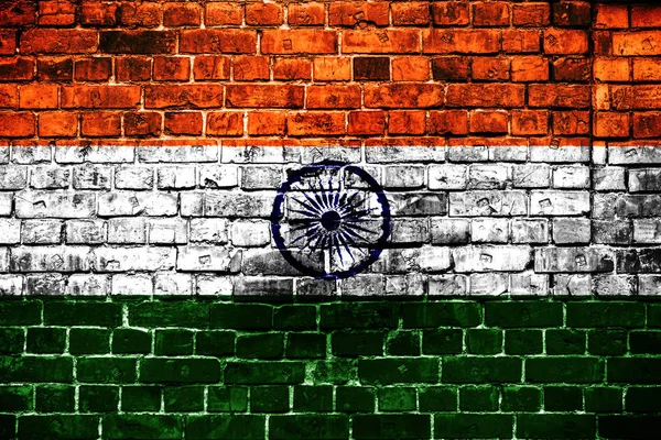 National flag of India on a brick background. Concept image for  India: language , people and culture.