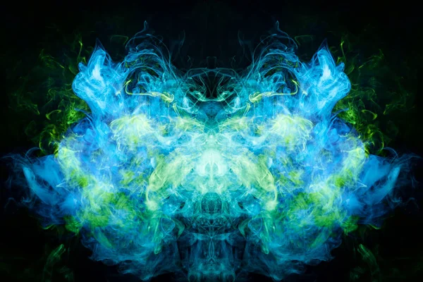Fantasy print for clothes: t-shirts, sweatshirts. Thick green, blue smoke on a black isolated background. Fire flames background.