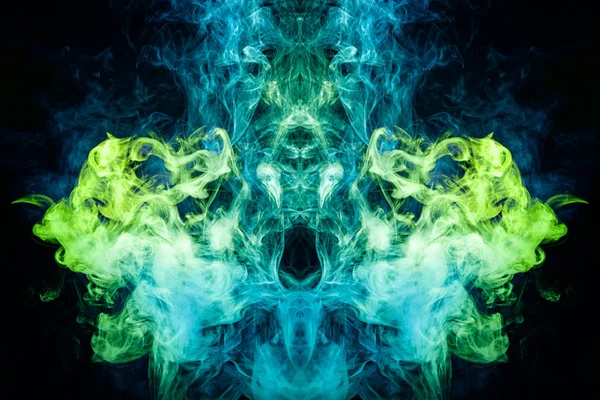 Fantasy print for clothes: t-shirts, sweatshirts. Thick green, blue smoke on a black isolated background. Fire flames background.