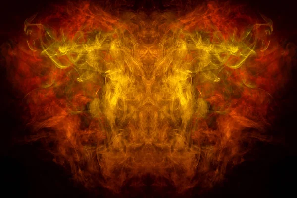 Mocap for cool t-shirts. Thick colorful yellow and orange smoke  in the form of a monster on a black isolated background. Background from the smoke of vape