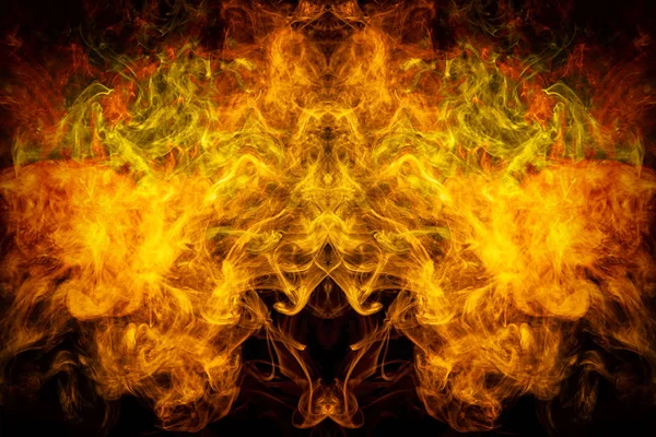Mocap for cool t-shirts. Thick colorful yellow and orange smoke  in the form of a monster on a black isolated background. Background from the smoke of vape