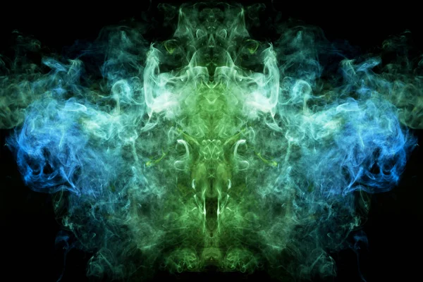 Fluffy Puffs  blue, yellow and green smoke and Fog in the form of a skull, monster, dragon  on Black Background. Fantasy print for clothes: t-shirts, sweatshirts