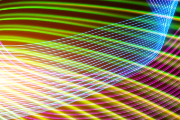 Abstract Yellow Pink Blue Green Neon Glowing Crossing Lines Pattern — Stock Photo, Image