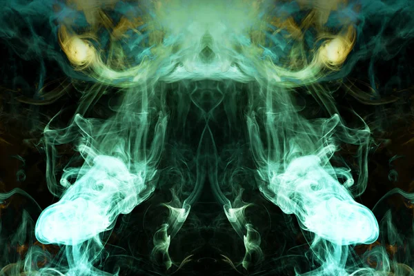 Mocap for cool t-shirts. Thick colorful green and yellow smoke  in the form of a monster on a black isolated background. Background from the smoke of vape