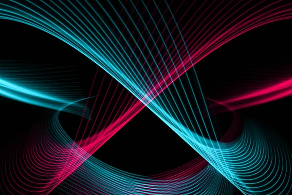 Abstract light blue, pink and yellow trails in random motion background image.Striped Neon Lights in Rainbow Colors